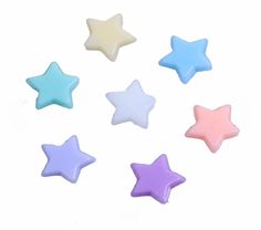 small star shaped candles in pastel colors