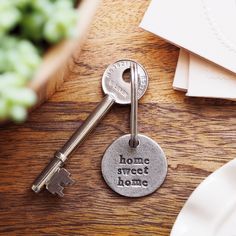 there is a key that says home sweet home on it