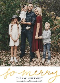 a family photo with the words go merry in gold foil on white paper, surrounded by leaves