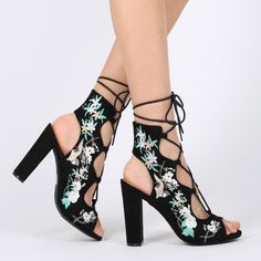 These Floral Booties Are Made With A Faux Suede Upper, Peep Toe And Lace Up Front. Also Made With Floral Embroidery On Sides And An Open Back Panel. New Never Worn. Black Round Toe Heels For Festival, Black Heels With Round Toe For Festival, Black High Heel Sandals For Festivals, Black High Heel Festival Sandals, Spring Festival Heels With Round Toe, Black Open Toe Heels For Festivals, Spring Embroidered Fitted Heels, Spring Floral Embroidered Block Heels, Embroidered Round Toe Sandals For Party