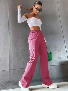 These Solid Colored High Waist Cargo Pants are the peak of casual-cool fashion. Made from pure polyester, they feature an elastic waist and pockets big enough for all your stuff. They'll keep you looking cool and feeling comfy. Who said you can't look fly while still being comfy-cozy? Specifications: Type: Cargo Pants Closure Type: Elastic Waist Details: Pocket Waist Line: High Waist Length: Long Fit Type: Regular Fit Fabric: Non-Stretch Composition: 100% Polyester Care Instructions: Machine was Pink Straight Leg Sweatpants With Pockets, Casual Full Length Sweatpants With Cargo Pockets, Pink Straight Leg Casual Cargo Pants, Casual Pink Straight Leg Cargo Pants, Pink Casual Parachute Pants With Multiple Pockets, Pink Baggy Cargo Pants, Casual Pink Parachute Pants With Cargo Style, Casual Pink Cargo Style Parachute Pants, Pink High-waisted Cargo Pants With Side Pockets