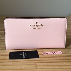 100% Authentic Brand New With Tags Madison Large Slim Bifold Wallet Saffiano Leather Conch Pink And Gold Hardware 6 3/4”L X 3 1/2”H Pink Kate Spade Wallet, Kate Spade Pink Bifold Wallet, Chic Kate Spade Bifold Wallet, Formal Pink Kate Spade Wallets, Kate Spade Wallet Pink, Kate Spade Card Holder, Pink Kate Spade, Small Leather Wallet, Leather Trifold Wallet