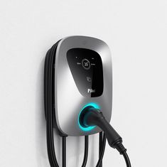 an electric car charger plugged into the wall