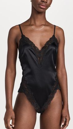 Fleur du Mal Venus Lace Teddy | Shopbop Elegant Camisole Bodysuit With Adjustable Straps, Elegant Low-cut Bodysuit With Built-in Bra, Elegant V-neck Lace Trim Bodysuit, Elegant Stretch Bodysuit With Adjustable Straps, Elegant Low-cut Bodysuit, Elegant Fitted Low-cut Bodysuit, Elegant Fitted Bottoms With Lined Body, Elegant Camisole Bodysuit For Night Out, Elegant Bodysuit With Boning For Night Out