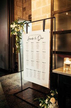 a table plan with flowers and candles on it