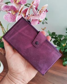 Purple Leather Wallet, Christmas Gift, Purple Purse, Women Purse, Leather Purse, Perseonalized Wallet, Phone Holder Wallet, money clip wallet, iphone wallet,  groomsmen gifts ❗This product is made of completely calf leather.❗ 👷Our product, which we prepared from 1.5 mm aged leather with traditional methods, is stylish and very useful, as well as having very high quality workmanship and materials. 🤎The use of handmade and quality leather will enable it to accompany you for many years, and it will acquire a completely special color for you as you use it. 💯Since our products are 100% handmade and the main material we use is leather, there may be slight differences from the images. ⭐ MAIN FEATURES ⭐ FEMALE AND MALE CAN USE ⭐ 1st CLASS CALF LEATHER ⭐ QUALITY WORKMANSHIP ⭐ 2 BIG SECTIONS ⭐ 8 Purple Leather Wallet For Gift, Purple Leather Wallet As A Gift, Purple Leather Wallets For Gifts, Purple Leather Wallet As Gift, Purple Leather Rectangular Wallet, Purple Rectangular Wallet With Interior Card Slots, Purple Rectangular Card Holder Gift, Rectangular Purple Card Holder Gift, Purple Coin Purse With Card Slots As Gift