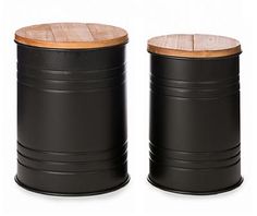 two black metal canisters with wooden tops