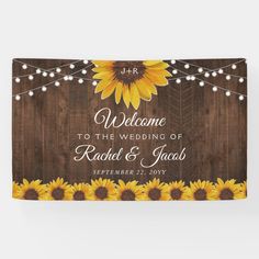 sunflowers and string lights are the focal point on this rustic wedding welcome sign