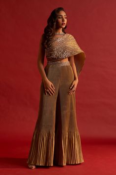 Shop for these amazing collections of Gold Pleated Silk Taffeta Embroidery Zardozi Asymmetric Tawny Jumpsuit For Women by Reeti Arneja online at Aza Fashions. Indian Outfits Modern, Embroidery Zardozi, Trendy Outfits Indian, Embroidered Jumpsuit, Lehenga Designs Simple, Jumpsuit For Women, Cocktail Outfit, Indian Dresses Traditional, Traditional Indian Outfits