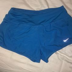 Brand New With Tags! Nike Workout Bottoms In Blue, Nike Blue Workout Bottoms, Nike Blue Shorts For Beach, Blue Nike Athletic Shorts For Running, Blue High-waisted Athletic Shorts With Pockets, Blue Nike Athletic Shorts, Nike Blue Athletic Shorts, Nike Blue Workout Shorts, Nike Blue Sportswear Shorts