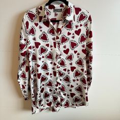 Brand New With Tags. Heart Pattern On White Background In A Traditional Button Down Style. Slightly Sheer, Longer Length. White Casual Blouse With Heart Print, Casual Red Shirt For Valentine's Day, Button Down Style, White Collared Shirt, Women's Button Down Shirt, Long Sleeve Sequin, Boho Shirts, Denim Button Down, Chambray Shirt