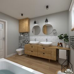 a bathroom with two sinks, a toilet and a bathtub