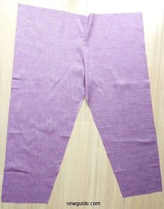 the bottom half of a pair of purple pants