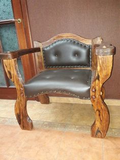 a chair made out of wood and leather