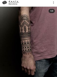 a man with a tattoo on his arm