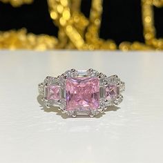 Sterling Silver White Topaz & Pink Sapphire Engagement Ring ...Marked 925...Total of weights 4.1grams...Size 8...Measure of stone center 7MM...It's in very good condition. Gia Certified Silver Cluster Ring, Gia Certified Silver Topaz Promise Ring, Gia Certified Silver Topaz Ring For Anniversary, Pink Sapphire Engagement Ring, Pink Sapphire Ring Engagement, Engagement Ring Size, Sapphire Engagement Ring, Engagement Ring Sizes, Sapphire Engagement