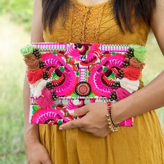 "This beautiful Clutch Bag is made with an amazing embroidered fabric made in the HMONG hill tribes of (Northern Thailand). It has a magnet opening and an inside zippered pocket. This bag is perfect to fit for ipad or phone, wallet, cosmetic etc. We buy materials from Hmong market and we design and sew by hand. Some of the bags we modify to improve the product. The Hmong tribes live in the North of Thailand You may not receive the exact bag picture here, As the fabric design may very slightly fr Boho Clutch Bag, Sew By Hand, Bohemian Clutch, Bag Picture, Embroidered Clutch Bag, Boho Chic Accessories, Boho Clutch, Embroidered Clutch, Northern Thailand