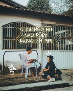 two people sitting on chairs in front of a building with a sign that says, u evanel ho nau doe bar fmn