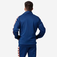 A jacket that you'll be jacked up to wear. Bundle up for your jog around the block with this Chicago Bears Stripe Logo Track Jacket. Features All-over team-colored design so you can rep the team in style Embroidered team logo display on left chest, in case there were any doubts where your allegiances lie Stripe accents on sleeves with repeat team logo displays for a little extra team spirit Zip-up structure so you can zip up and party down Long sleeves so you can stay warm, even on the chillier Logo Display, Allegiant, Chicago Bears, Track Jacket, The Block, Track Jackets, Team Spirit, Stay Warm, Team Logo