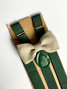 "Natural linen bow tie and suspenders .    All items are handmade. Please contact me if you need free swatches  **Please Specify Above**  SET- Bow Tie and Suspenders SUSPENDERS- One Pair of our Quality Suspenders BOW TIE- clip-on style/or pre-tied style  SUSPENDERS NOT REAL LEATHER (FAUX LEATHER) Baby: newborn- 1Y * Bow Tie: 3in wide * Suspenders: Faux leather ,Y- Back, 8in- 16in Toddle: 2 years- 5 years Bow Tie: 3.5in wide * Suspenders: faux leather, Y- Back, 16in- 25in Kids: 6years-12years * B Green Bow Tie For Father's Day Gift, Adjustable Bow Tie For Suit As Gift, Adjustable Bow Tie For Gifts, Father's Day Gift Green Bow Tie, Adjustable Bow Tie Back Belt For Wedding, Adjustable Belts And Suspenders For Father's Day Gift, Adjustable Belts And Suspenders As Father's Day Gift, Adjustable Wedding Belt With Bow Tie Back, Adjustable Green Bow Tie For Father's Day