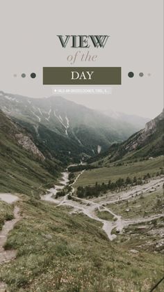 a view of the valley and mountains with text overlay that reads view of the day