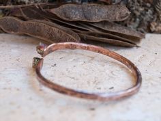 Bangle copper bracelet Rustic jewelry Bangles hammered copper Anniversary gift for wife Raw gemstone bracelets Boho Jewelry Minimalistic Reach for the sun with the Peridot crystal, an effervescent stone that harnesses the life-giving energy that turns night into day. The Vitamin D of your healing crystal collection, the Peridot crystal meaning is connected to the sun, making it your spiritual cheerleader that keeps you on the sunny side of life. The Peridot crystal shines like a light beam of en Jewelry Bangles, Bracelets Boho, Copper Anniversary Gifts, Copper Anniversary, Peridot Crystal, Anniversary Gift For Wife, Contemporary Ring, Rustic Jewelry, Light Beam