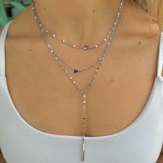 Dainty with a hint of white, this precious necklace is just the thing you've been dreaming of. This stainless steel beauty can be worn all the time; you can sleep, shower, and sweat in it. From the gym to work, this little cutie can be worn with essentially any outfit!Stainless steel with acrylic beads, 14" plus a 3" extender Trendy White Gold Necklace Gift, Trendy White Gold Necklace With Adjustable Chain, White Gold Necklace With Satellite Chain For Gift, Trendy White Gold Sterling Silver Necklace, Silver Drop Necklace With Clavicle Chain Gift, Adjustable White Gold Clavicle Chain Necklace, Trendy White Gold Necklace, Silver Charm Necklaces With Satellite Chain, Silver Drop Necklace For Everyday Wear