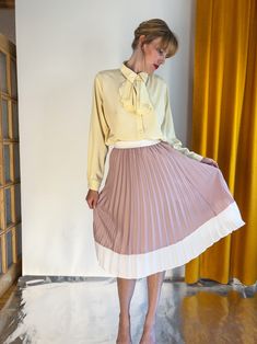 "1980's Light Pink Vintage Accordion Pleated Midi Skirt / Romantic everyday skirt TAG: - SIZE: approx M MATERIAL: 100% polyester MEASUREMENTS (measured lying flat)   lenght: 70 cm / 27.5\"   waist: 33 cm / 13\" NICOLA is 178 cm / 5'8 tall and wears size M/38 CONDITION: excellent TAKE A PEAK AT GINGERINN SOCIALS:   https://www.gingerinn.space/   https://www.facebook.com/gingerinn/   https://www.instagram.com/ginger.inn/   https://vm.tiktok.com/ZMdx3gGDL/" Feminine Cream Pleated Skirt, Feminine Cream Skirt For Daywear, Spring Vintage Fashion Fitted Skirt, Fitted Vintage Fashion Skirt For Spring, Fitted Skirt For Spring Vintage Fashion, Feminine Pleated Skirt For Daywear, Retro Flared Skirt For Spring, Vintage Pleated Mini Skirt, Vintage Fashion Skirt For Spring