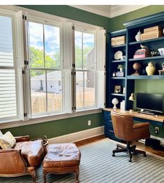 Shown here, striking darker green paint color on the walls, Benjamin Moore White trim, Farrow and Ball Hague Blue paint color on the built-in bookcases and desk. 

#greenpaint #builtins #homeoffice Bm Green Paint Colors, Farrow And Ball Hague Blue, Types Of Green, Greige Paint, Hague Blue