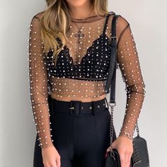 Material: Mesh Vegan Pearl Embellished See Through Long Sleeves Not Refundable Not include Bra SIZE BUST LENGTH SLEEVES S 84cm (Approx.) 51cm (Approx.) 58cm (Approx.) M 88cm (Approx.) 53cm (Approx.) 59cm (Approx.) L 92cm (Approx.) 55cm (Approx.) 60cm (Approx.) XL 96cm (Approx.) 57cm (Approx.) 61cm (Approx.) Mesh Blouse, Mesh Shirt, Lace Outfit, Blouse Material, Style Noir, Mesh Long Sleeve, Glam Rock, Party Tops, Lace Shirt