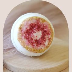 Discover the rejuvenating effects of our Ruby Bath Bomb, designed to provide a nourishing and calming bath experience. Carefully crafted to mimic natural geodes, our bath bombs bring a touch of nature to your routine. This bath bomb has scent notes of raspberry, peach, wild honeysuckle, and jasmine. Approx. 5 oz. Ingredients Baking soda, citric acid, corn starch, SLSA, cream of tartar, avocado oil, polysorbate 80, fragrance oil, cocoa butter alcohol, distilled water, kaolin clay, Sea Salt, Mica Wild Honeysuckle, Scent Notes, Polysorbate 80, Distilled Water, Kaolin Clay, Cream Of Tartar, Citric Acid, Bath Bomb, Avocado Oil