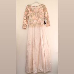 Nwt Adrianna Papell Pale Peach Gold Floral 3/4 Sleeve Dress W/ Taffeta ***Note Loose Threads On Back In Last Photo Embroidered Metallic Tread, On Mesh Overlay 3/4 Sleeve Top Over Full A-Line Taffeta Dress Full Taffeta Skirt ****Does Not Include Belt*** Style- Ap1e203037-Pale Peach Multi Spring A-line Dress For Mother Of The Bride, Mother Of The Bride Half Sleeve Dresses For Spring, Summer Wedding Dresses With 3/4 Sleeves, Pink 3/4 Sleeve Evening Dress, Half Sleeve Dresses For Spring Wedding Guests, Feminine 3/4 Sleeve Formal Dresses, Pink Half-sleeve Evening Dress, Summer Formal Long Sleeve Mother Of The Bride Dress, Pink Long Sleeve Mother Of The Bride Dress