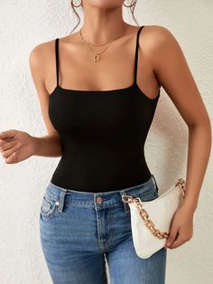 The versatile black Criss Cross Backless Cami Bodysuit is ideal for any situation. It has a spaghetti strap neckline and a basic design for a traditional yet contemporary appeal. The sleeveless shape and natural waistline make it easy to wear, and the backless design with crisscross detailing gives a playful touch. This cami is likely to become a favorite, whether you're searching for a discreet addition to your wardrobe or something to make a statement. Specifications: Color: Black Pattern Type: Plain Type: Cami Neckline: Spaghetti Strap Details: Backless, Criss Cross Sleeve Length: Sleeveless Waist Line: Natural Fit Type: Slim Fit Fabric: Slight Stretch Material: Fabric Composition: 95% Polyester, 5% Spandex Care Instructions: Machine wash or professional dry clean Sheer: No Size Chart(c Body Noir, Cami Bodysuit, Fabric Suppliers, Black Pattern, Criss Cross, Spaghetti Strap, Spandex, Sleeve Length, Slim Fit