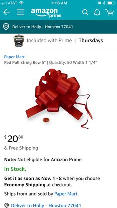 an amazon gift card with red bows on it