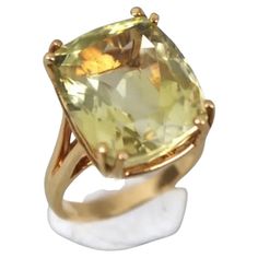 Stunning 14k Yellow Gold light green citrine ring. Approximately 10.22 Grams TW. The dimensions are approximately 10.2 mm x 15mm. Approximately 9 carats. Marked 14k. Approximate size 7.5. Green Citrine, Citrine Ring, Gold Light, Cocktail Ring, Cocktail Rings, Citrine, Light Green, Gemstone Rings, Jewelry Rings