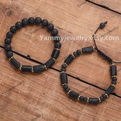 Material : Black Tourmaline  &  Lava Stone . Length: About 7.5inches(19cm) .   Quantity: 1 Pc . They make a great everyday Bracelet that can be worn on its own, or layered with other Bracelet ! These add the perfect touch for any boho look. Crystsal stone are meaningful,can bring health and happiness,it is the best gifts for you or family and friend in any occasion! PRODUCTION TIME & SHIPPING - All products are made to order here at Yammy Jewelry! - If you need express shipping, there will be op Handmade Black Friendship Bracelets Gift, Handmade Black Friendship Bracelets For Gift, Spiritual Black Friendship Bracelets, Black Beaded 8mm Jewelry For Friendship, Black Round Beads Jewelry For Friendship, Black Spiritual Friendship Bracelets Adjustable, Adjustable Crystal Bracelet With Black Beads As Gift, Handmade Black Jewelry For Friendship, Lava Stone Bracelets With Gemstone Beads For Gifts