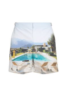 "Find ORLEBAR BROWN Slim Aarons Photographic Bulldog Swim Shorts on Editorialist. Orlebar Brown \"Bulldog\" swim shorts Slim Aarons artwork reworked exclusively in house Adjustable branded nickeleffect side fastener Nickeleffect concealed snap closure Front slash pockets Single back pocket Mid length Polyester Made in Portugal" Vacation Pool Shorts, Short Bottoms For Pool Vacation, Vacation Pool Bottoms In Short Style, Summer Bottoms For Pool In Short Length, Relaxed Fit Poolside Bottoms, Short Summer Bottoms For Pool, Spring Poolside High-waisted Shorts Swimwear, Vacation Poolside Short Bottoms, Spring High-waisted Swim Shorts