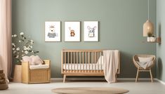 a baby's room with green walls and pictures on the wall, including a crib