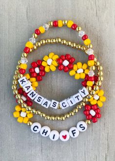 Kansas City Bracelets ❤️💛❤️💛 Are you ready for some football?? 🏈 🏈 Get game day ready with this cute football stack. Sold individually or as a set. *If you would like something custom or different wording, please put in Personalization section* CARING TIPS FOR YOUR JEWELRY ⭐️Treat and store with care. ⭐️ For longevity, avoid exposing your jewelry to water. ⭐️ Avoid having direct contact with lotions, perfumes, sanitizers as these chemicals may cause discoloration of your jewelry. Kc Cheifs, Girls Bracelets