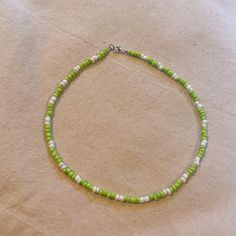 green and white seed bead necklace, colorful beaded necklace, summer necklace, beaded necklace Green Beaded Necklaces With Large Beads For Summer, Green Round Bead Necklaces For The Beach, Green Beaded Necklaces For The Beach, Adjustable Green Beaded Necklace With Letter Beads, Adjustable Green Beaded Necklaces With Letter Beads, Green Letter Beads For Summer, Green Tiny Beads Necklace For Beach, Green Letter Beads Necklace For Beach, Green Beach Necklace With Colorful Beads