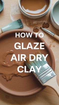 how to glaze air dry clay on a wooden table with paint and brushes in the background