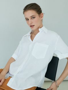 Editor's NotesOUIE's pure linen shirt has a natural and cozy mood. You can wear it with any jeans or skirt as a daily look.- One pocket on the chest- Breathable and cool fabric- Mother of pearl buttons- Open collar- Roll up sleevesMeasurement (inch)One size- Shoulder: 14.17 in.- Bust: 24.01 in.- Sleeve length: 8.66 in.- Total length: 26.37 in.* Model info: Height: 5'8, Bust: 31in. , Waist 22.83 in., Hip 34.64 in. Fitting size:SComposition & Care - 60%Tencel, 40%Linen- Hand wash with cold water/Dry cleaning- Do not use washing machineDesigner- by OUIE Relaxed White Linen Blouse, Casual White Linen Blouse, Effortless Summer Shirt For Casual Gatherings, Casual Linen Blouse With Pockets, White Relaxed Fit Blouse With Pockets, White Linen Collared Blouse, Casual Linen Shirt For Daywear, Chic Short Sleeve Linen Shirt, White Relaxed Fit Blouse With Rolled Sleeves