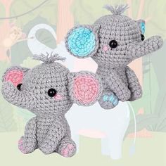 two small crocheted elephants sitting next to each other