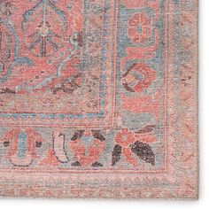 an old rug with various designs and colors