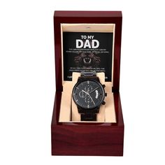 a watch in a wooden box with an ad for it's dad on the back