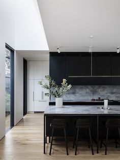 the kitchen is clean and ready to be used as a dining room or office space