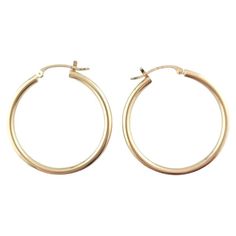 14 Karat Yellow Gold Hoop Earrings- These classic gold hoops are a timeless addition to your collection. Size: 29.8 mm x 2.3 mm x 2.4 mm. Stamped: 14K Weight: 1.0 dwt./ 1.6 gr. Very good condition, professionally polished. Will come packaged in a gift box or pouch (when possible) and will be shipped U.S. Priority Mail Insured. AD0223202417KCS Classic 14k Stamped Hoop Earrings, Classic 14k Gold Hoop Earrings For Everyday, Classic 14k Gold Huggie Earrings, Classic 14k Gold Hypoallergenic Hoop Earrings, Classic Gold Hoop Huggie Earrings, Classic Gold Huggie Hoop Earrings, Classic Hoop Earrings As Gift, Classic Round Hoop Earrings For Everyday, Everyday 14k Gold Hallmarked Hoop Earrings