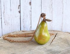 "Chunky long necklace with greenery pear pendant, vegan jewelry, gift for her pear 2\" x 1\" (5x3cm) chain 32\" (80cm) more fruit jewelry https://www.etsy.com/listing/496706714/chunky-charm-pendant-long-boho-necklace?ref=shop_home_active_1 Please, keep the jewellery away from perfume and other alcohol containing fluids because the alcohol damages the Polymer clay. Store the fragile items in separate boxes and treat them with care. Misuse may result in damage. Visit my shop https://www.etsy.com/s Green Pear Shaped Necklace For Gift, Green Pear Shaped Necklace Gift, Green Pear-shaped Necklace For Gift, Pear-shaped Green Jewelry For Gifts, Pear-shaped Green Jewelry Gift, Handmade Pear-shaped Necklace For Gift, Handmade Pear-shaped Necklace Gift, Cherry Necklace, Fruit Necklace