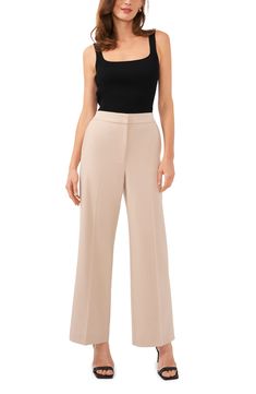 Vertical front creases elongate the legs of these polished pants designed with an elastic-back waist. 30 1/2" inseam; 22" leg opening; 12" front rise; 16 1/2" back rise (size 8) Zip fly with hook-and-bar closure Side-seam pockets Unlined 68% polyester, 28% rayon, 4% spandex Machine wash, tumble dry Imported Formal Stretch Wide Leg Dress Pants, Wide-leg Dress Pants With 4-way Stretch For Work, Full Length 4-way Stretch Wide Leg Pants For Work, Elegant Stretch Wide-leg Pants, Formal High-waisted 4-way Stretch Dress Pants, Formal High-waisted Dress Pants With 4-way Stretch, Sleek Formal Pants With Elastic Waistband, Elegant Ankle-length Dress Pants With 4-way Stretch, Wide-leg Workwear Dress Pants