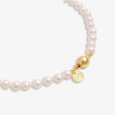 Our Organic Pearls collection is made of the highest quality Freshwater Pearls. Hand-picked to create each piece, this pearl necklace is endlessly versatile and timeless. Small dainty pearls are strung with classic medium-sized pearls to create a modern asymmetrical design. Layer with your favorite VE gold chain to make this piece pop! MATERIALS Certified AAA grade Freshwater Pearls 18K Gold Vermeil 925 Solid Silver 18K Gold Plated Lobster claw clasp 100% Handmade with care 100% Nickel Free Come Timeless Gold Pearl Necklace With Round Beads, Anniversary Pearl Necklace With Charm, Akoya Pearl Necklace With Round Beads And Pearl Charm, Timeless Pearl Necklace With Round Beads And Pendant, Classic Gold Pearl Necklace With Round Beads, Classic Gold Single Strand Pearl Necklace, Timeless Pearl Necklace With Charm For Anniversary, Timeless Pearl White Necklace With Pearl Charm, Refined Pearl Chain Necklace For Anniversary